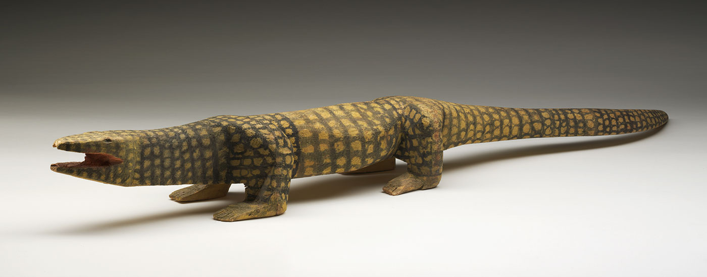 Wooden sculpture of a goanna.
