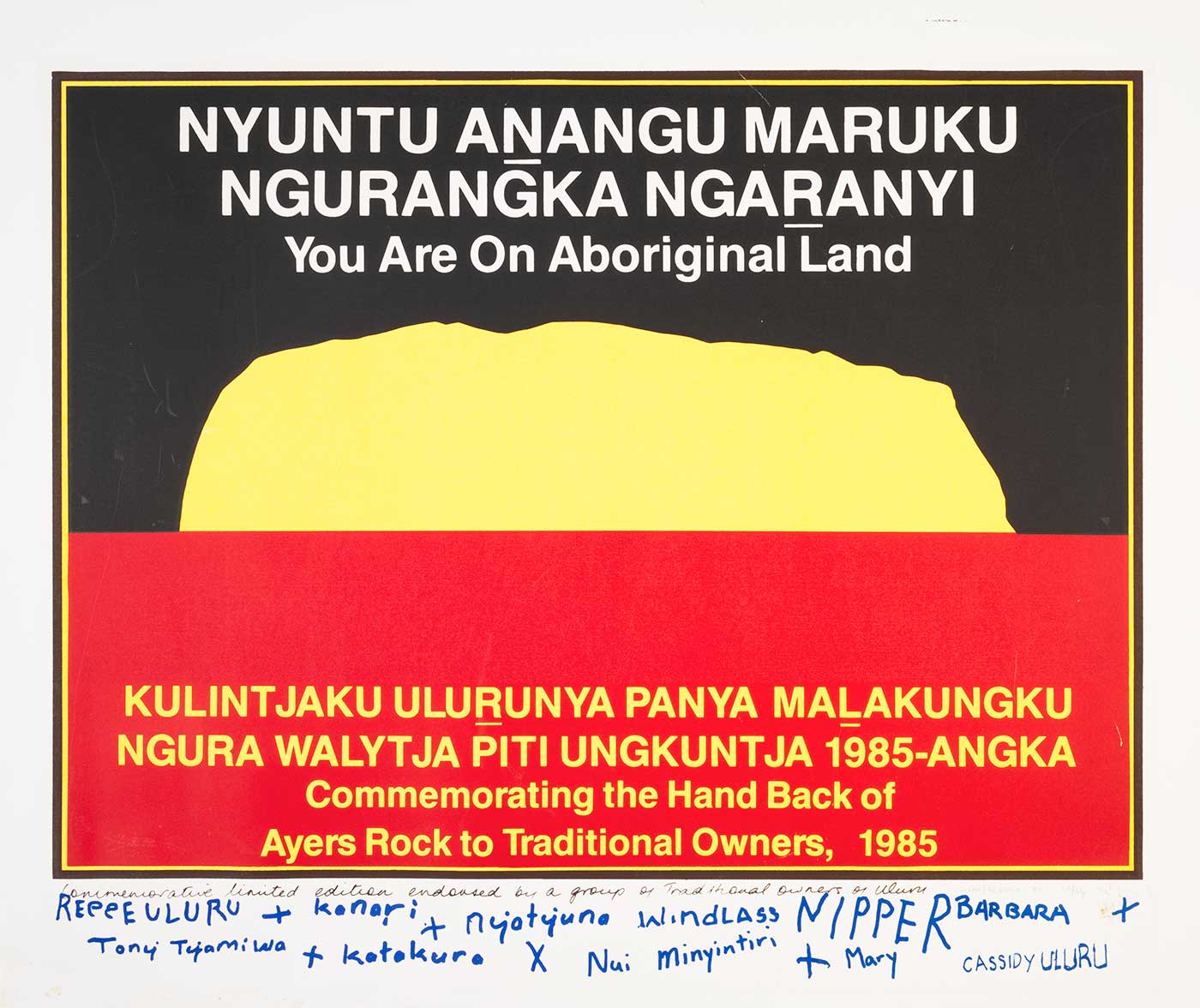A limited first edition print poster similar in design to the black over red Aboriginal flag, but the sun in the centre has been replaced by a yellow silhouette of Uluru (Ayers Rock).