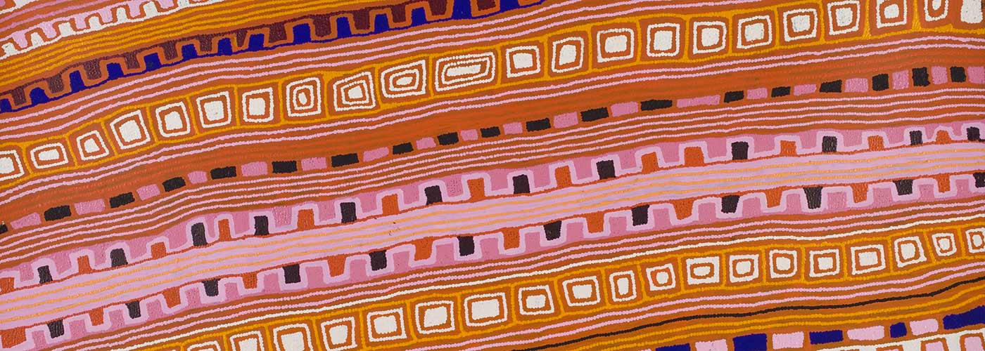 A pink toned horizontally striped textured painting on canvas with rows of geometric patterns of concentric squares, stripes, crenellated line and pattern blocks. The rows are slightly diagonal moving from the lower left corner to the upper right section. At the top there are lighter colours of white, orange, pale pink and yellow with squares, crenellated lines and stripes. Then there is a blue and maroon crenellated line. Below this the central section has orange, yellow, dark pink and a bit of white in brick pattern, squares, crenellation and stripes. The bottom section contains a row of alternate blue and pink rectangles then crenellation and stripes in pink, dark pink, orange brown, yellow and a little white. The bottom edge has the measurement '183 x 122cm' while the top edge has the code 'PO/112/DT'. In the bottom right corner is an arrow in blue marker.