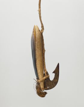 Fishhook ipa or aipa Large fishhook, with wood shank backed with mother-of-pearl and tied together. A barbed tortoiseshell hook also attached to the end.