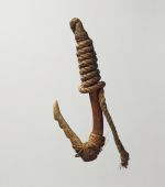 Fishhook matau Fishhook with a wooden shank, bone point and lashing of twisted cords of plant material.