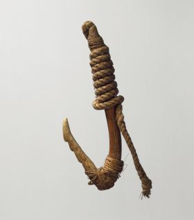 Fishhook matau Fishhook with a wooden shank, bone point and lashing of twisted cords of plant material.