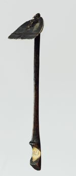 oz436.jpg Tattooing comb made of wood and plant fibre. The blade is made from bone.