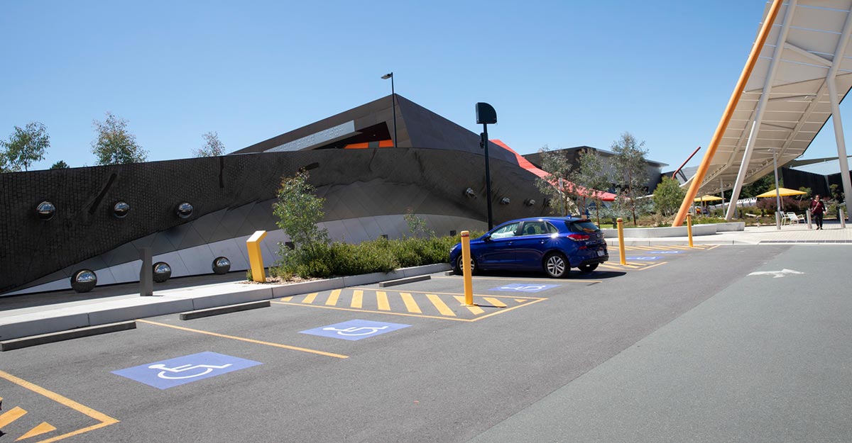 Car park with disabled parking spaces.