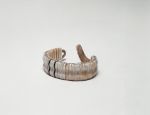 Bracelet kupe’e Bracelet made from ivory or dog teeth and turtleshell and strung together on a cord.