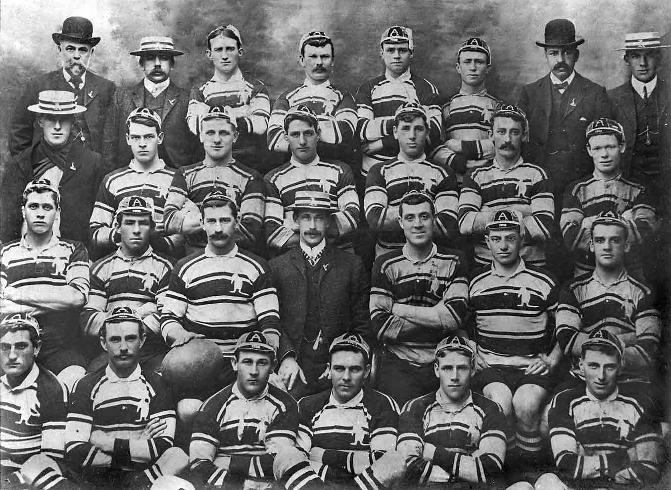 Group shot of Australian rugby union team, in four rows.