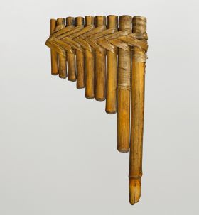 Panpipe Panpipe consisting of nine bamboo segments arranged in one plane next to each other. The bamboo segments are bound together with plant fibre strips.