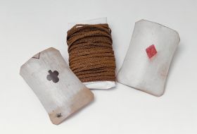 111.jpg Cord made of coconut fibres and wound round old English playing cards.