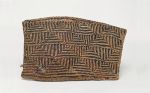 Basket kete Basket made of light and reddish to dark brown flax strips plaited in a geometric pattern.