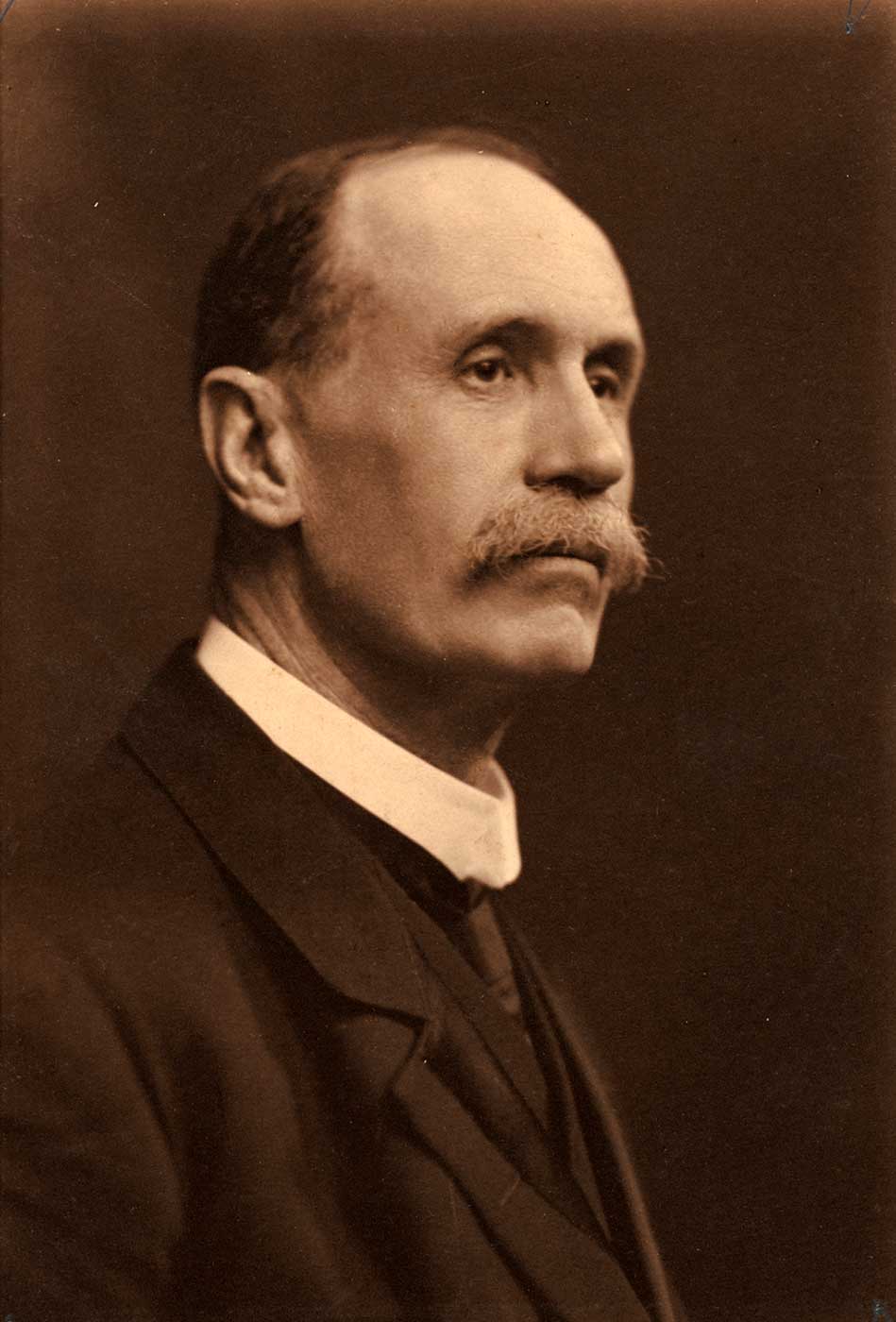Photographic portrait of JHP Murray