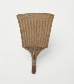 92.jpg Fan made of pandanus leaves, coconut fibres and wood. The leaves woven to create a pattern consisting of triangles.