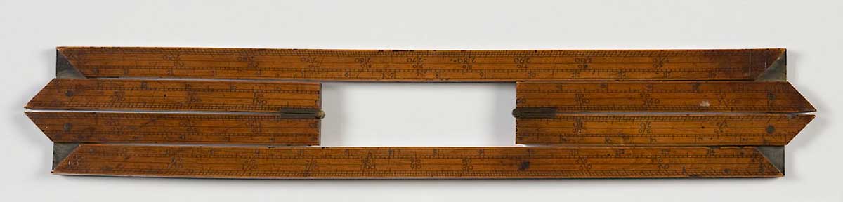 Folded wooden frame with brass hinges.