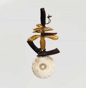 Pendant tuinga Pendant consisting of a number of elements such as bone, fish teeth and pieces of tortoiseshell tied on a string. The lowest element is a white, perforated shell disc.