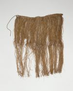 Skirt Skirt or apron made from fine shred of plantain leaf, dyed and knotted to a string that fastens around the waist.
