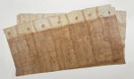 Barkcloth ngatu tahina Large piece of glazed barkcloth decorated with a pattern of diagonal and vertical brown lines with a white border and large brown spots and stripes at both ends.