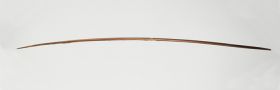 Bow Short bow made of brown wood that tapers sharply towards both ends.