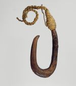 205.jpg U-shaped fishhook made from a piece of hardwood made secure with cord.
