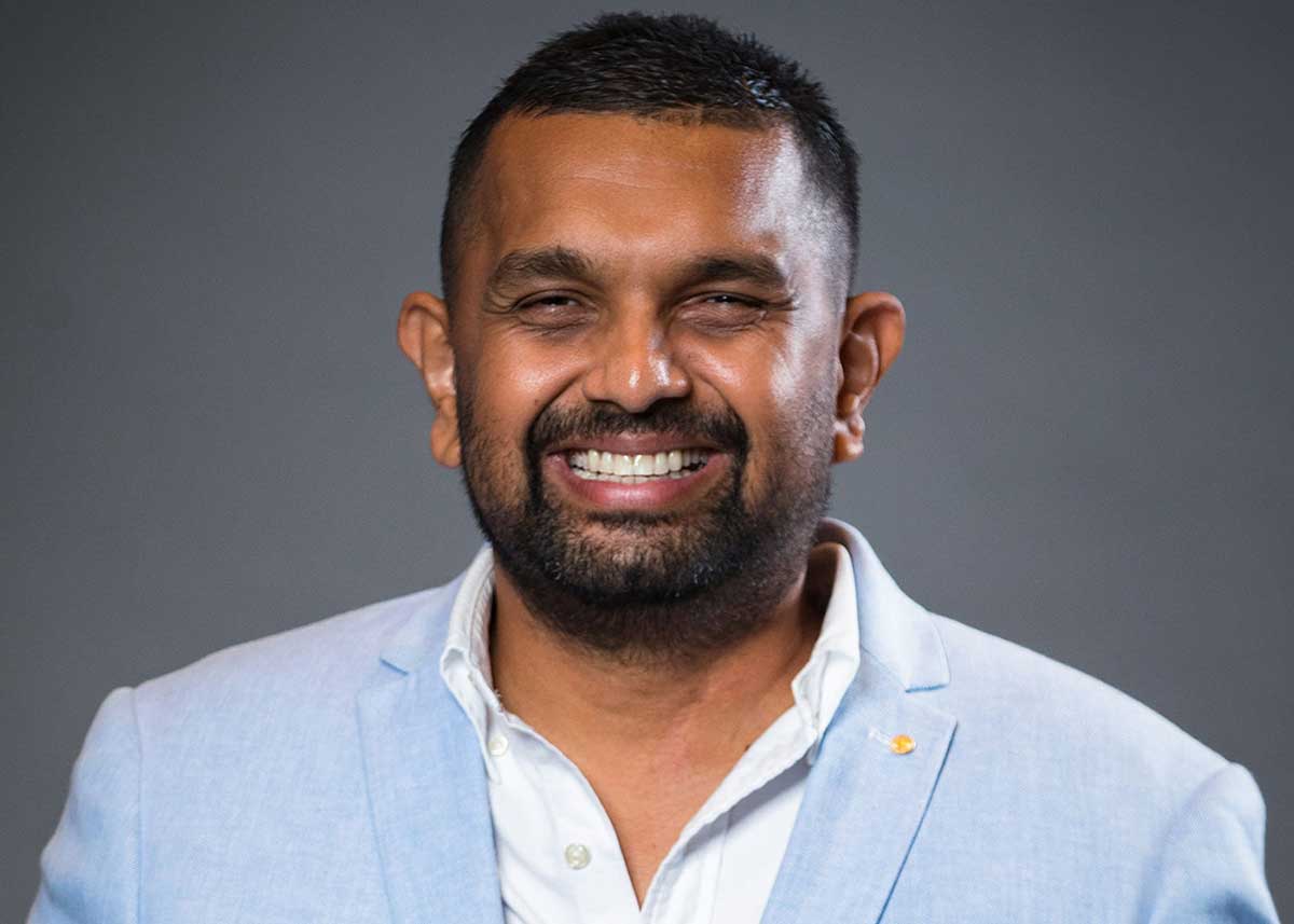 Studio portrait photograph of Dinesh Palipana.